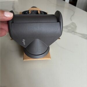 Dyson supersonic flyaway attachment.  Brand new in sleek gray